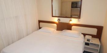 Guns N’ Roses em Curitiba: Hospede-se com conforto e estilo no CHA Prime Hotel!